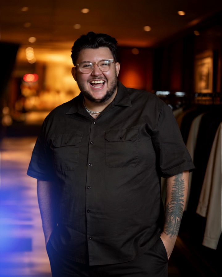 Tom Sharman, laughing, in a dark shirt, September 2026