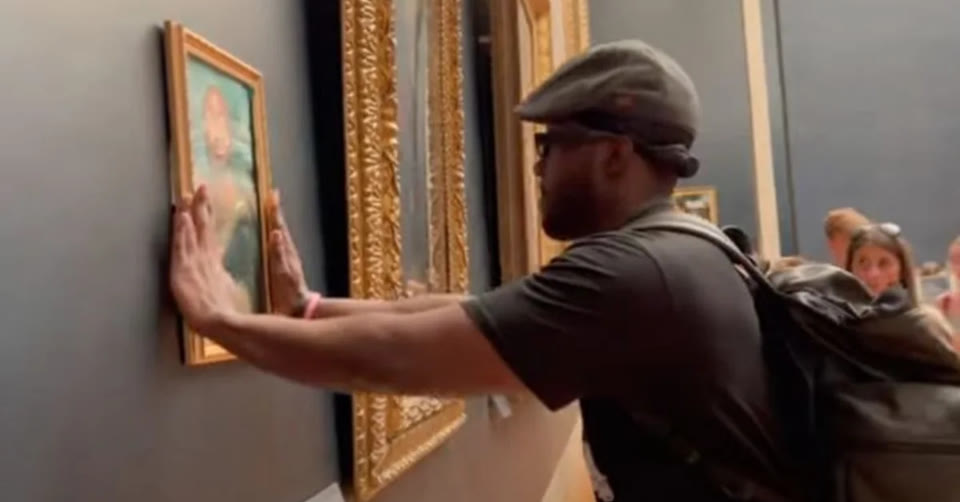 YouTuber spends night in French jail after hanging fake portrait next to the 'Mona Lisa' for a prank