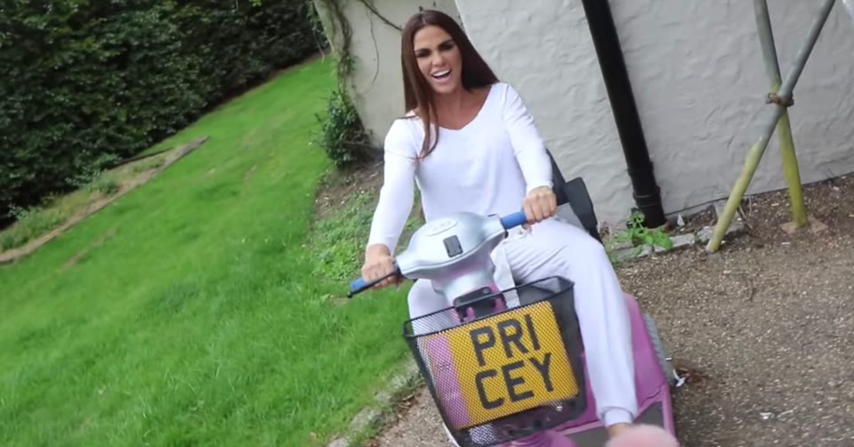 Katie Price shows off customised pink mobility scooter after being banned from driving